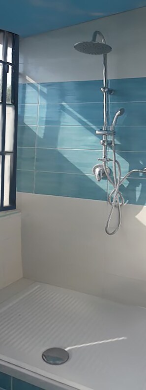 Shower, hair dryer, bathrobes, towels