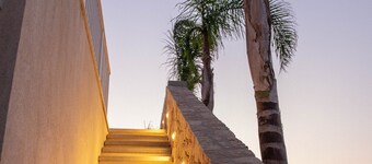 Charming outbuilding with swimming pool in a private villa