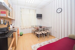 Fridge, microwave, electric kettle, dining tables