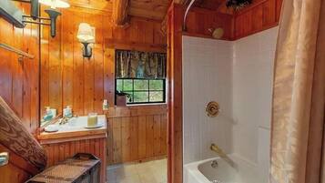 Combined shower/bathtub, hair dryer, towels, soap