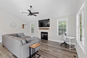 TV, fireplace - Lakefront Getaway: Dock, Kayaks, Fire Pit, 70" TV (Lexington)