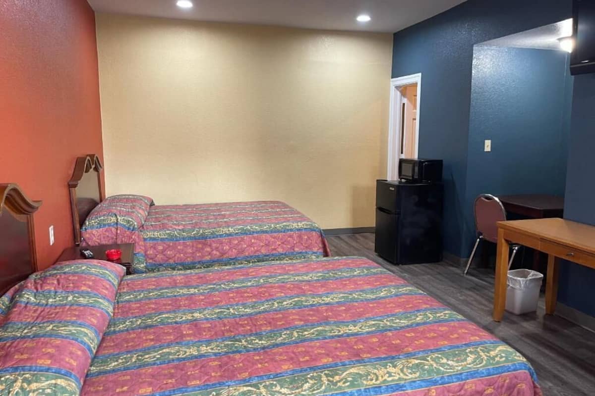 Deluxe Double Room | Down comforters, individually furnished, blackout drapes, free WiFi