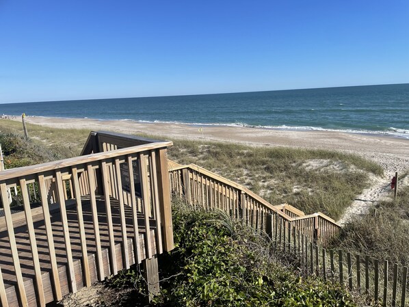 On the beach, sun loungers, beach towels