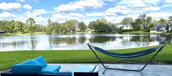 Luxe Townhome Retreat | Golf Resort & Lake View | Spacious 3BR with Workspaces & Screened Patio