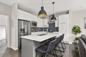 Fridge, microwave, dishwasher, coffee/tea maker