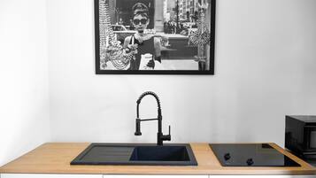 Fridge, microwave, cookware/dishes/utensils, paper towels