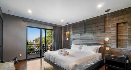 Live in luxury in this meticulously updated 3BR/3BA Claremont Heights mid-century modern home w/ AC.