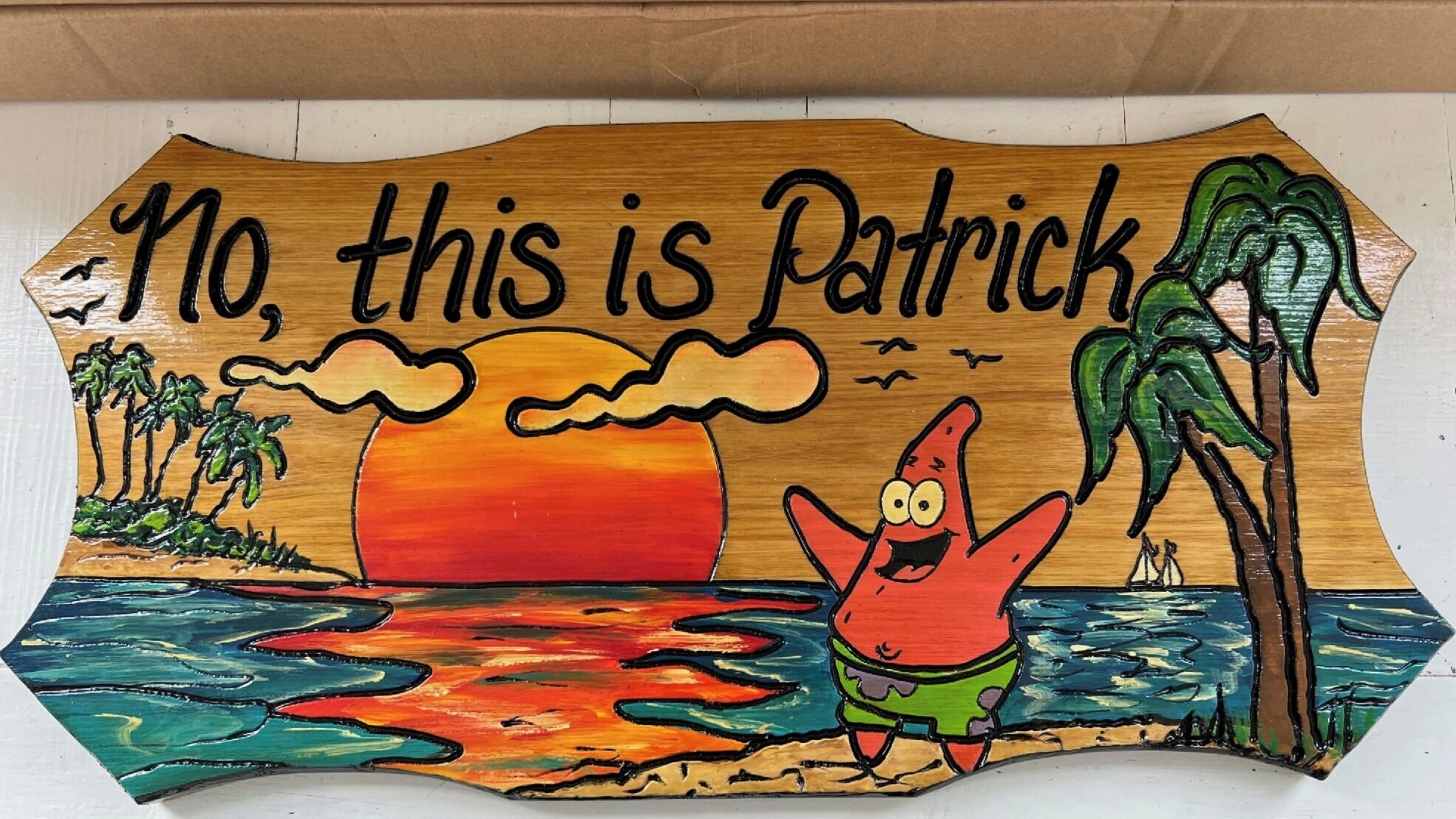 A wooden sign with a cartoon character and a sunset background.
