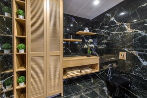 Bathtub, hair dryer, towels