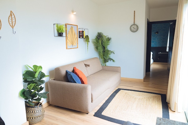 Comfort Apartment | Living area | 32-inch Smart TV with cable channels, TV