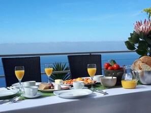 Outdoor dining - Casa Oliva-Panorama: Large designer apartment, fantastic views, heated pool (Arco da Calheta)