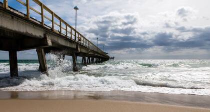 Comfortable Condo with Pool & Fishing Dock – Walk to the Beach, No Car Needed!