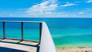A balcony with a clear view of the ocean and beach. - BeachFront Luxury Hotel | 3B OceanView Hyde Resort (Hollywood)