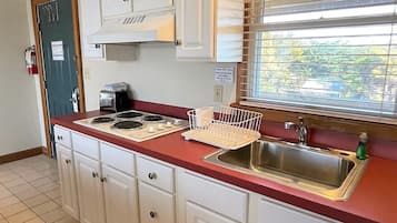 Superior Suite, Balcony, Pool View | Private kitchen | Coffee/tea maker