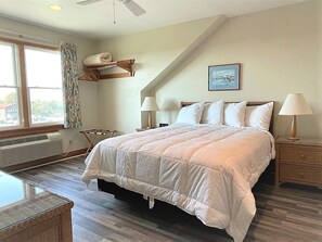 Superior Suite, Balcony, Pool View | Pillowtop beds, laptop workspace, blackout drapes, free WiFi - Pony Island Inn (Ocracoke)