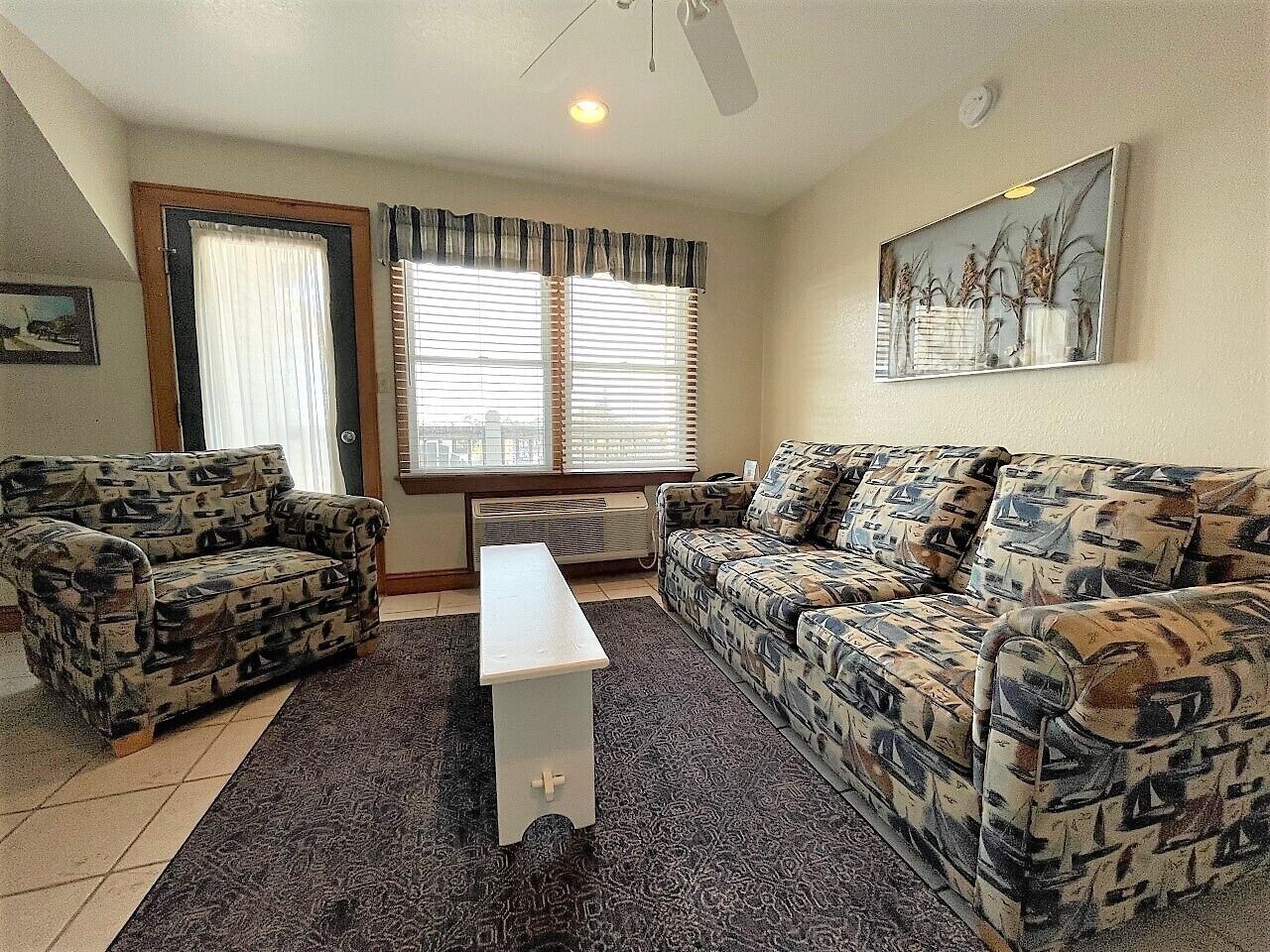 Premium Room, 1 Queen Bed, Balcony, Pool View | Living area | Flat-screen TV