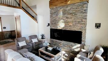 Smart TV, fireplace, books