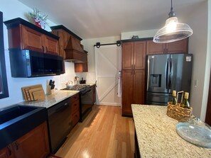 Fridge, microwave, oven, stovetop - The 1801 House: A beautiful historic home in the Ste Genevieve Historic District (Ste. Genevieve)