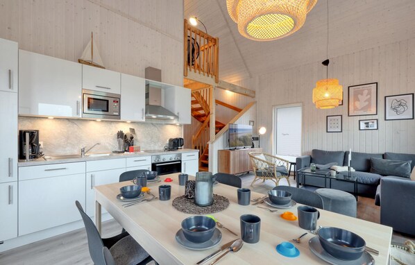 Fridge, stovetop, dishwasher, coffee/tea maker