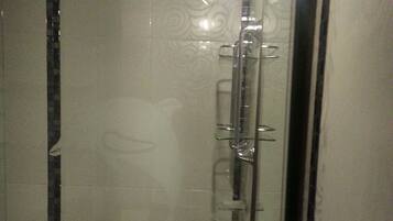 Shower, towels, soap, toilet paper