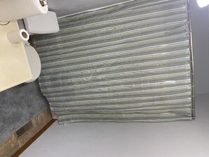 Combined shower/bathtub, hair dryer, towels, soap