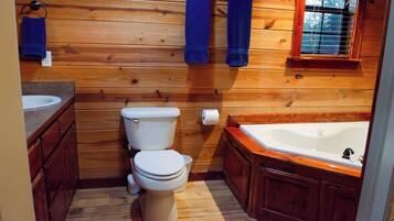 Bathtub, jetted bath, hair dryer, towels