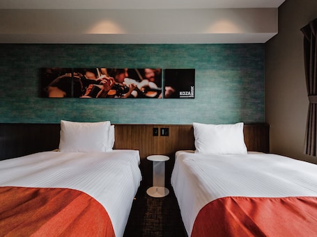 Down comforters, individually decorated, individually furnished, desk. Music Hotel Koza by Coldio Premium