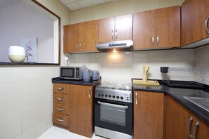 Standard Apartment | Private kitchen - Premium 1 BHK in La Vista Silicon Oasis (Dubai)