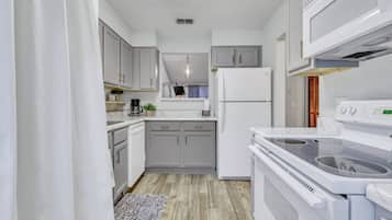 Fridge, coffee/tea maker, cookware/dishes/utensils