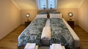 2 bedrooms, iron/ironing board, travel crib, bed sheets