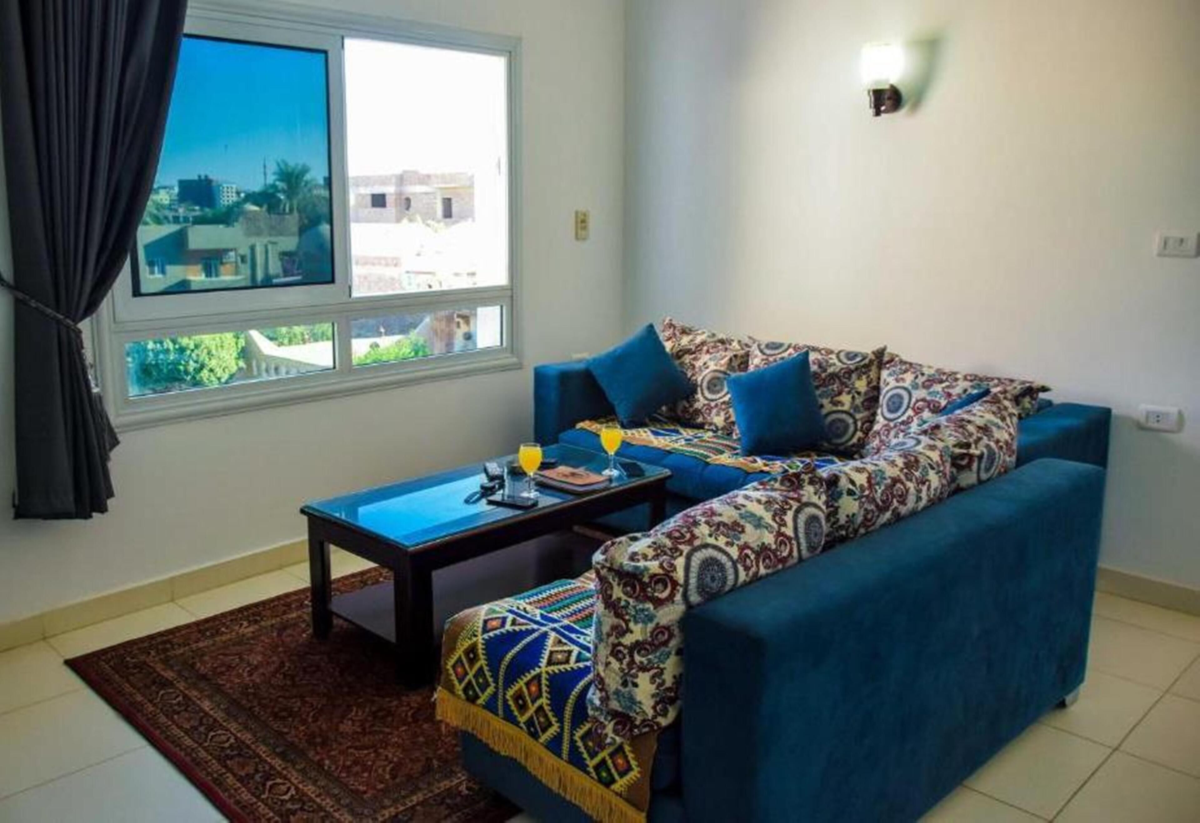 Deluxe Apartment, 2 Bedrooms, River View | Living room | 32-inch LCD TV with satellite channels, TV