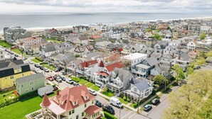 A coastal residential area with houses, a beach, and a view of the ocean. - Pet Friendly 1st Floor Apt 2 Blocks to Beach & Main Ave | Private Entrance | ... (Ocean Grove)