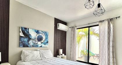 Comfortable modern apartment conveniently located for shopping and dining.