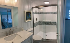 Combined shower/tub, hair dryer, towels, soap