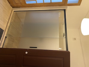 Enjoy the seamless transition to the outdoor area through the large glass sliding door.