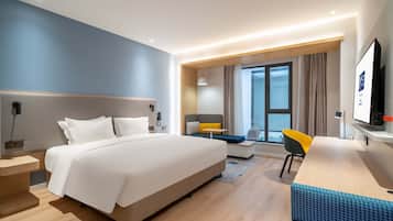 Standard Room, 1 King Bed (Atrium View) | In-room safe, desk, soundproofing, iron/ironing board