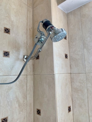 Combined shower/tub, hair dryer, towels, soap