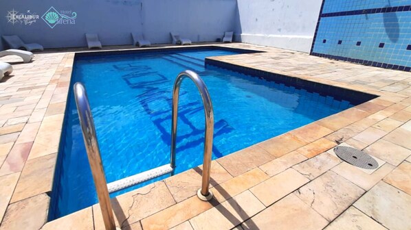 Outdoor pool, pool umbrellas, pool loungers