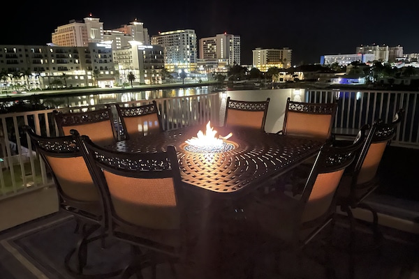 Rooftop view from large table that sits 8. Views of the city and intracoastal