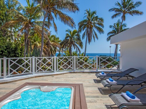 PLAYA CHICA by Buenavilla | perfect beachfront villa in a prime location.