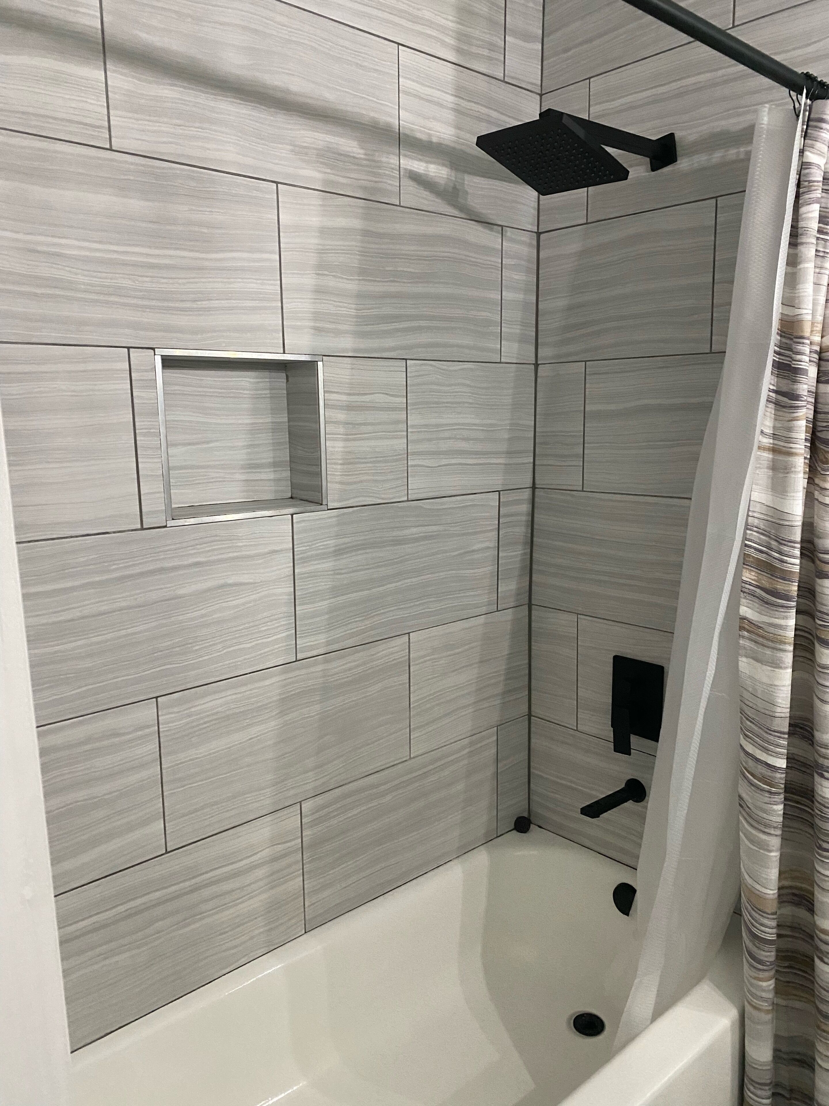 Bathtub, hair dryer, towels, soap