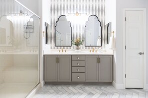 Combined shower/tub, hair dryer, towels, soap