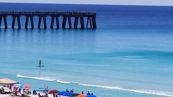 On the beach, sun loungers