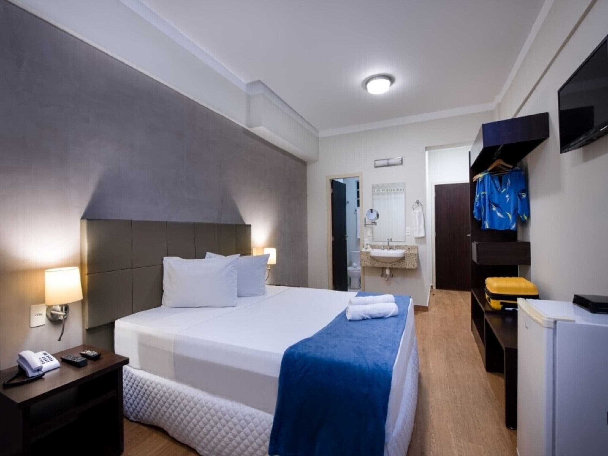 Hypo-allergenic bedding, minibar, desk, laptop workspace