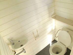 Shower, hair dryer, towels, toilet paper