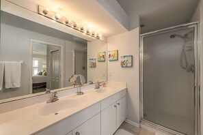 Combined shower/bathtub, hair dryer, towels, toilet paper