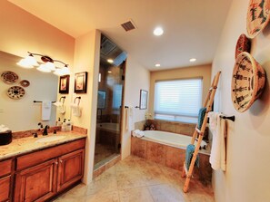 Combined shower/bathtub, hair dryer, towels, soap