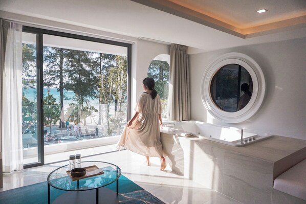 Oceanfront Suite | Down comforters, in-room safe, individually decorated - Anona Beachfront Phuket Resort (Patong)