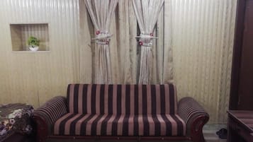 Family Suite | Living area | LED TV