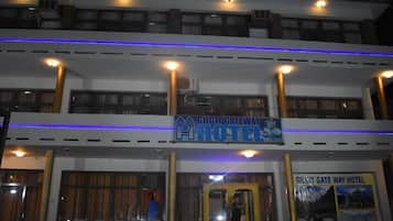 A hotel with a sign reading "Gilgit Gateway Hotel" and a visible entrance.